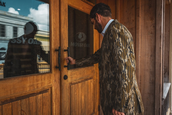 A Man wearing a Perfect Pattern Sportcoat in the Original Bottomland Mossy Oak pattern.